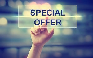 Text: special offer with hand touching the words